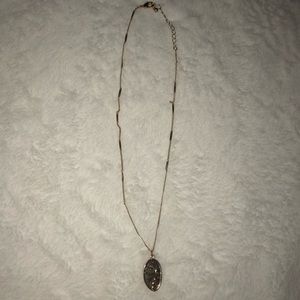 Layering face necklace